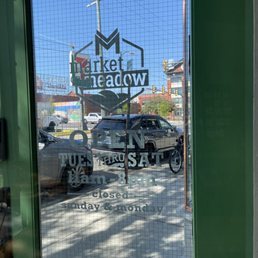 Exterior outside entrance of Market on Meadow - Front door, open Tuesday-Saturday 11am-8pm Closed Sunday and Monday - Richmond, Virginia Exterior outside entrance of Market on Meadow - Front door, open Tuesday-Saturday 11am-8pm Closed Sunday and Monday - Richmond, Virginia