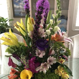 One side of the arrangement. You can see different flowers on every angle. One side of the arrangement. You can see different flowers on every angle.
