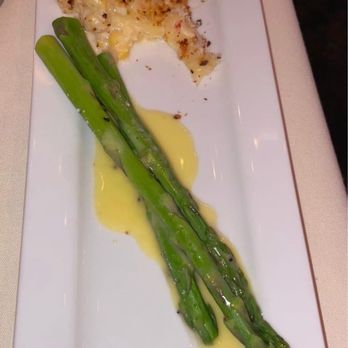 Halls Chophouse - Creamed corn and asparagus with hollandaise. - Steakhouses Near Me - Nashville, Tennessee Halls Chophouse - Creamed corn and asparagus with hollandaise. - Steakhouses Near Me - Nashville, Tennessee