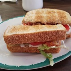 Sand Castle Restaunt - Not a $6.95 sandwich. For that price it includes fries at most places.