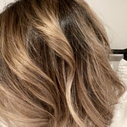 Tangled Up Hair Studio - High contrast dark brown with blonde pieces. Taken inside with 60 watt/2700 warm lighting several hours after color and style.