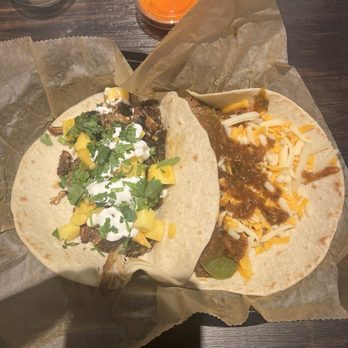 Torchy's Tacos - Jamaican Jerk taco on the left, beef fajita on the right - Tacos Near Me - Altamonte Springs, Florida Torchy's Tacos - Jamaican Jerk taco on the left, beef fajita on the right - Tacos Near Me - Altamonte Springs, Florida