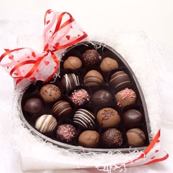 Snowflake Chocolates - Truffles in a chocolate shell heart.