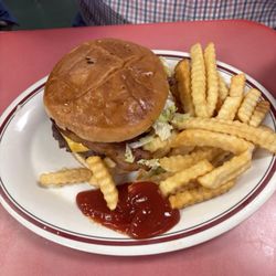 San Andres Family Restaurant - Double bacon cheeseburger and fries. Delicious!