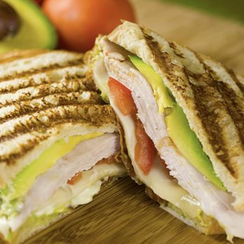 Croutons - a cut in half sandwich on a cutting board - Sandwiches Near Me - Carlsbad, California Croutons - a cut in half sandwich on a cutting board - Sandwiches Near Me - Carlsbad, California