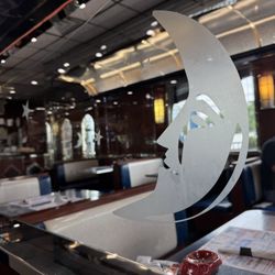Etching on glass between booths