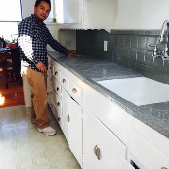 Discovery Coatings - 12/27/14 : Gargie modeling my new granite-look counter top. - Refinishing Services Near Me Discovery Coatings - 12/27/14 : Gargie modeling my new granite-look counter top. - Refinishing Services Near Me