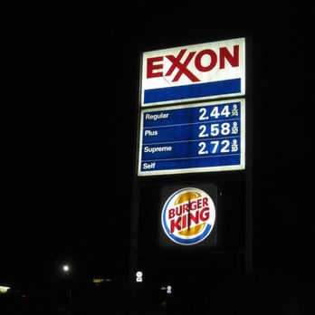 Burger King - a gas station sign lit up at night - Fast Food Near Me - Raphine, Virginia