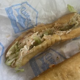 This lobster is hard and the 2 rolls are the size of a middle finger !!   Cajun Catfish Sandwich