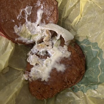 McDonald's - a half eaten hamburger with a bite taken out of it - Burgers Near Me - Lynn, Massachusetts
