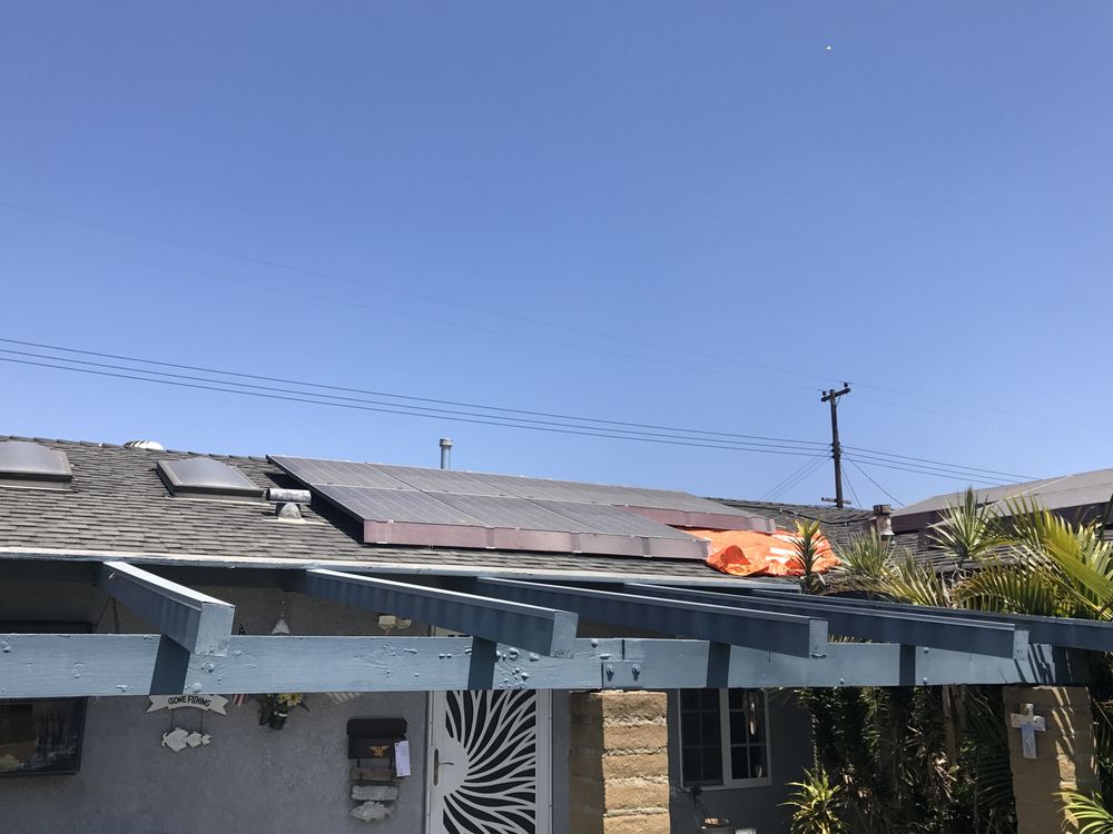 Slide of The Local Friendly Roofer