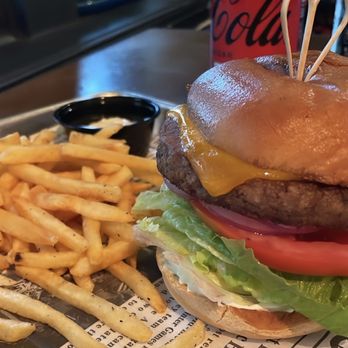 Mindpub Cafe - The Evie Burger on a gluten free bun (veggie burger, lettuce, tomato, onion, pickle cream cheese schmear) and fries - Venues & Event Spaces Near Me - Baltimore, Maryland