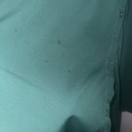 Hot wax splattered on my blouse Hot wax splattered on my blouse