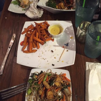 The Cafe - Remains of a pesto veggie burger, the sweet potato fries and curry dipping sauce, and very oily stir fry noodles. - Sandwiches Near Me - Key West, Florida The Cafe - Remains of a pesto veggie burger, the sweet potato fries and curry dipping sauce, and very oily stir fry noodles. - Sandwiches Near Me - Key West, Florida