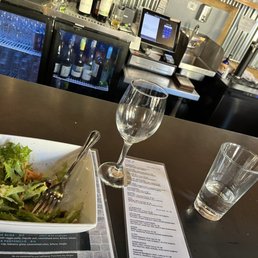 House salad with glass of Chardonnay