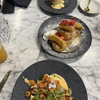 Flavor Rich Restaurant - Fish and grits (blackened salmon), caramelized banana French toast, chicken biscuit. - Breakfast & Brunch Near Me - Suwanee, Georgia Flavor Rich Restaurant - Fish and grits (blackened salmon), caramelized banana French toast, chicken biscuit. - Breakfast & Brunch Near Me - Suwanee, Georgia