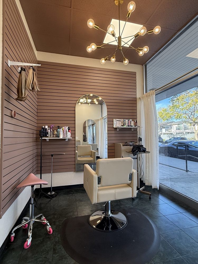 Illuminated Barber Lounge Logo