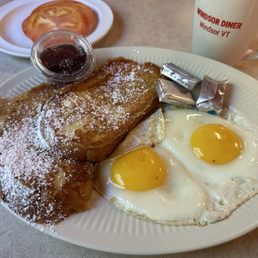 Two Eggs with Bacon, Ham or Sausage, Two Pancakes or French Toast