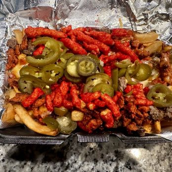 Ortega's Asada & Wings - Half asada, half Al Pastor hot fries. - Chicken Wings Near Me - Millcreek, Utah Ortega's Asada & Wings - Half asada, half Al Pastor hot fries. - Chicken Wings Near Me - Millcreek, Utah