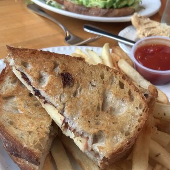 Terrain Cafe - Grilled Cheese (front) with an Avocado Toast in the background - New American Near Me - Westport, Connecticut Terrain Cafe - Grilled Cheese (front) with an Avocado Toast in the background - New American Near Me - Westport, Connecticut
