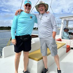 Lookout Cruises - My husband and his German cousin-in-law loving life!