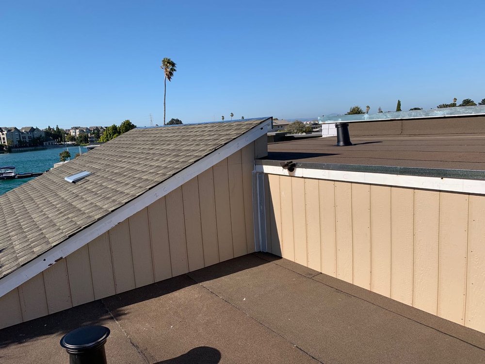 Slide of Caruzo's Roofing Contractors