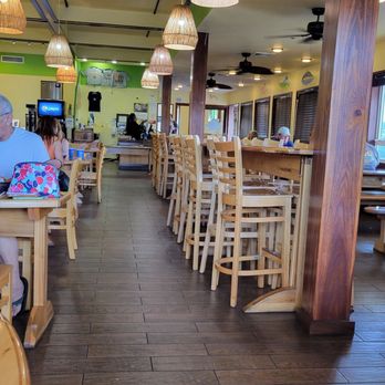 Coconut's Fish Cafe - Kamaole - Lots of indoor seating on a Friday early evening 4:30pm. - Seafood Near Me - Kihei, Hawaii Coconut's Fish Cafe - Kamaole - Lots of indoor seating on a Friday early evening 4:30pm. - Seafood Near Me - Kihei, Hawaii