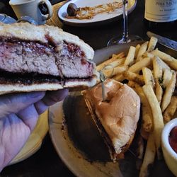 Wagyu Burger w/ crispy prosciutto and fries.  One of the best burgers I ever had!