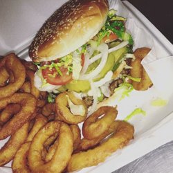 Ramiro's - Harolds burger 1/2lb chicken breast, 1/2lb beef patty, cheese, bacon and all the goodies