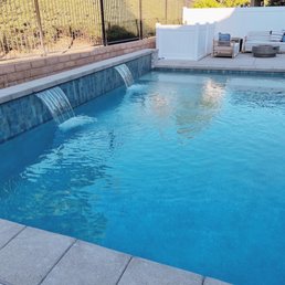 We love the fountains and back wall that Endless Summer designed.