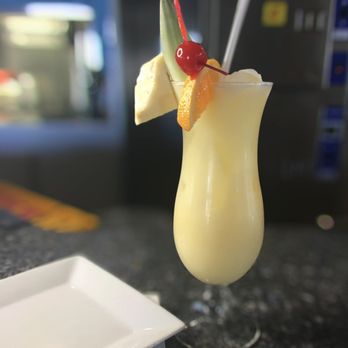 Fishbones Raw Bar And Restaurant - a tropical drink - Seafood Near Me - Duck, North Carolina Fishbones Raw Bar And Restaurant - a tropical drink - Seafood Near Me - Duck, North Carolina
