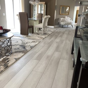 Mitzora Flooring - a living room and dining room - Flooring Near Me