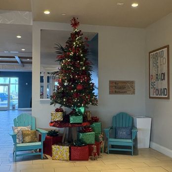 Compass Hotel by Margaritaville Flagler Beach - Christmas tree by the elevator - Hotels Near Me - Flagler Beach, Florida Compass Hotel by Margaritaville Flagler Beach - Christmas tree by the elevator - Hotels Near Me - Flagler Beach, Florida