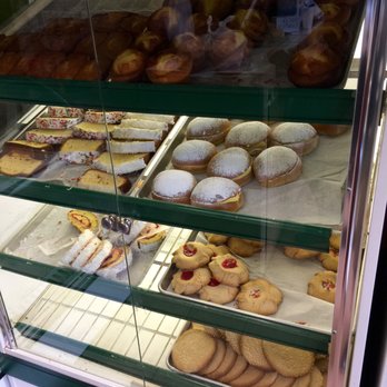 San Carlos Bakery - Top Row: Polvoron; Second left: Pasteles; Second right: Chilindrina; Third Left: Nino envuelto; Third Right: Ojos de buey; Bottom- Galletas - Bakeries Near Me - Suitland, Maryland San Carlos Bakery - Top Row: Polvoron; Second left: Pasteles; Second right: Chilindrina; Third Left: Nino envuelto; Third Right: Ojos de buey; Bottom- Galletas - Bakeries Near Me - Suitland, Maryland