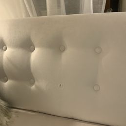 Before: untufted couch cushion and button fell off