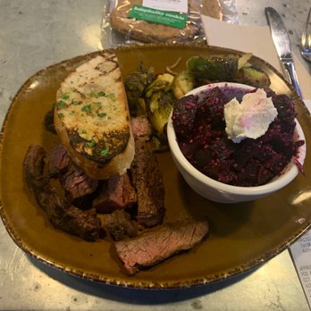 Urban Plates - Grilled Steak Brussels sprouts Beet salad with goat cheese Side bread - New American Near Me - Irvine, California Urban Plates - Grilled Steak Brussels sprouts Beet salad with goat cheese Side bread - New American Near Me - Irvine, California