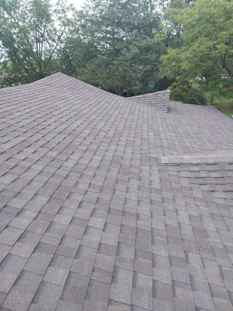 Slide of Tyndal Roofing