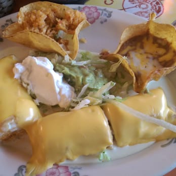 Cazador - Chicken wrapped in fried tortilla with cream cheese and covered with American cheese - Mexican Near Me - Ankeny, Iowa
