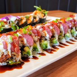 Mori Sushi & Grill by Aji - Crazy Night: fresh water eel, cucumber, avocado, topped with krab salad, fresh tuna, wasabi mayo, unagi sauce, fish egg ($17).