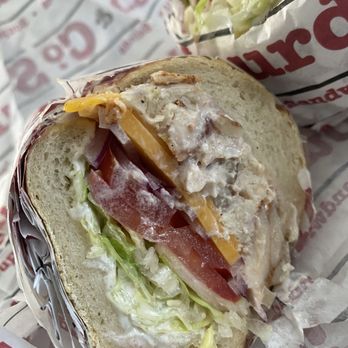 Sourdough & Co. - Chicken salad sandwich (4inch) on sourdough bread with Mayo, lettuce , tomato, & cheddar cheese 9/10 - Sandwiches Near Me - Orange, California Sourdough & Co. - Chicken salad sandwich (4inch) on sourdough bread with Mayo, lettuce , tomato, & cheddar cheese 9/10 - Sandwiches Near Me - Orange, California