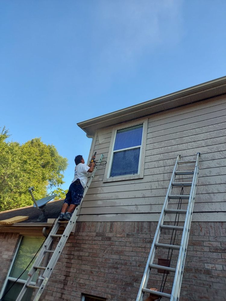 Slide of Daniel's Roofing and Painting
