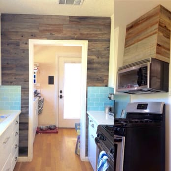 Coyote Designs - Repurposed redwood fence boards added as a ascent wall and hood fan - General Contractors Near Me Coyote Designs - Repurposed redwood fence boards added as a ascent wall and hood fan - General Contractors Near Me
