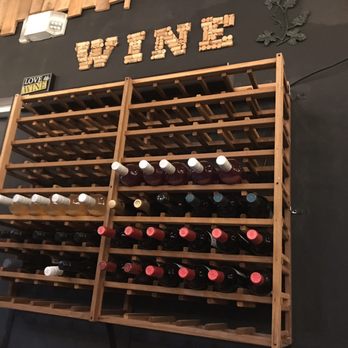 Pizza To Go - Cute decor with a wine selection along with many bottled beers - Pizza Near Me - Luquillo, Puerto Rico