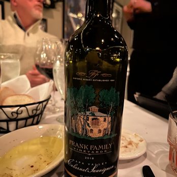 Paul Manno's Cafe - a bottle of wine on a table - Italian Near Me - Chesterfield, Missouri Paul Manno's Cafe - a bottle of wine on a table - Italian Near Me - Chesterfield, Missouri
