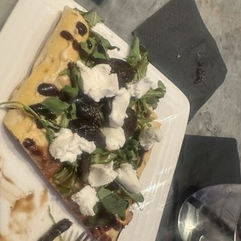 VICE VERSA Patio & Lounge - The bad fig, goat cheese and arugula flatbread. It doens't look bad, but.... - Lounges Near Me - Las Vegas, Nevada