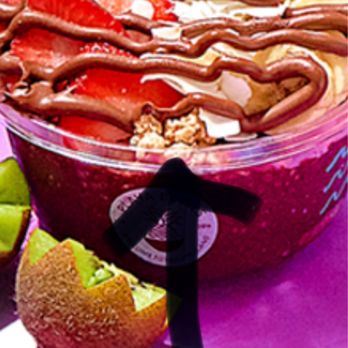 Playa Bowls - The granola topping is shown at the top of the bowl under the fruit. - Acai Bowls Near Me - Fairfax, Virginia