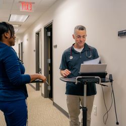 PartnerMD - Dr. Norris reviews information with his nurse