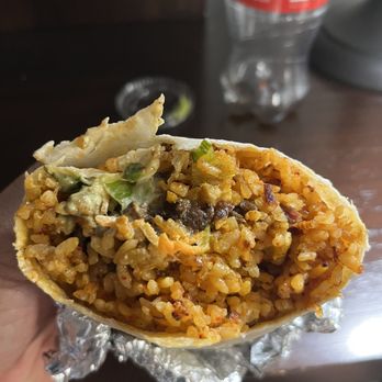 Seoul Taco - 90% rice little pieces of meat and lettuce. - Korean Near Me - Chicago, Illinois
