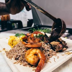 Siano’s Karibbean CookHouse - Creole shrimp and jerk chicken combo plate