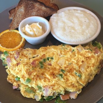 Blue Dolphin Cafe - Ham onions and green pepper omelette with a side of grits and wheat toast! Enough to share:) - Breakfast & Brunch Near Me - Sarasota, Florida